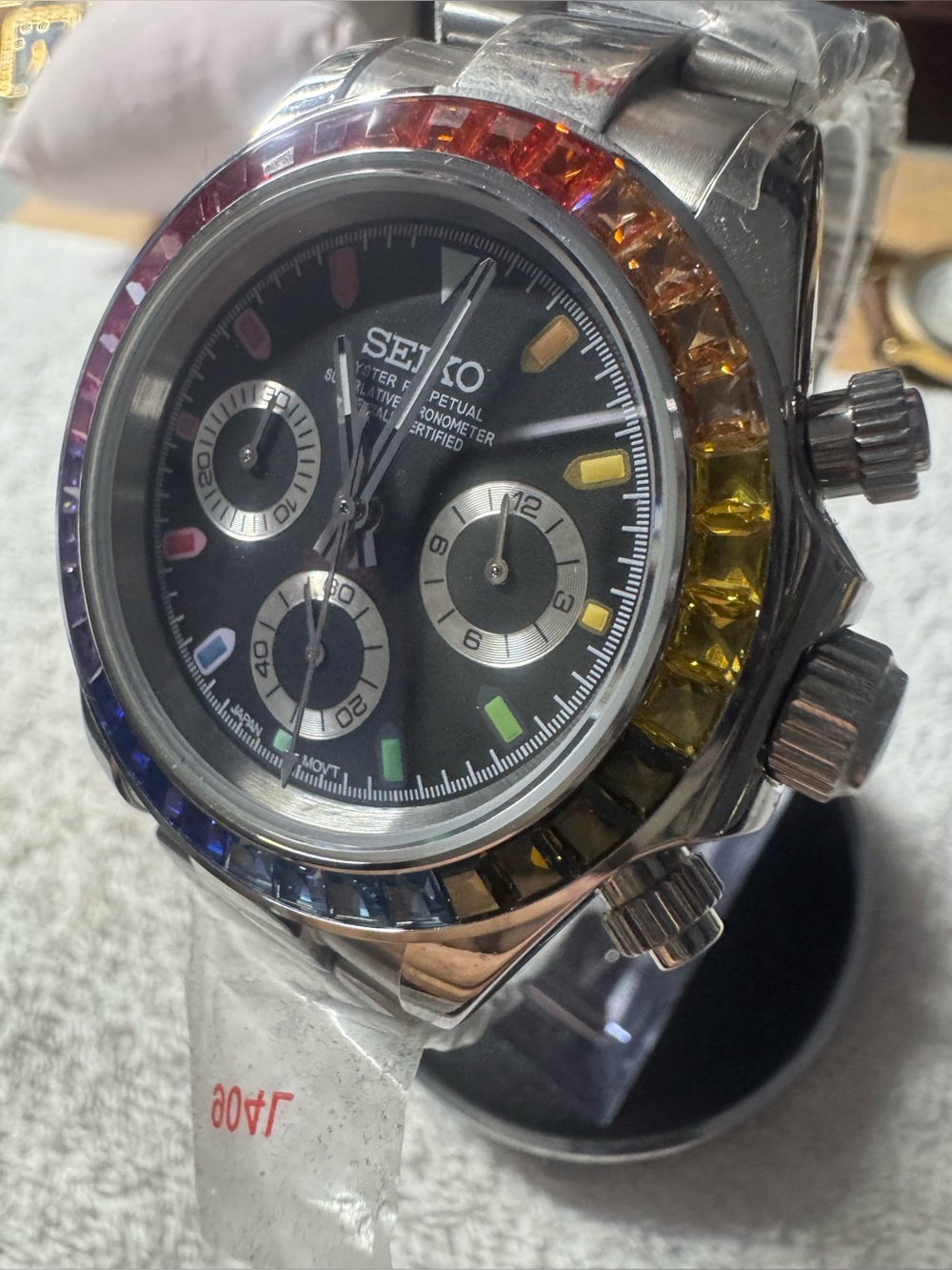 Seiko Men’s Black Dial Chronograph Watch with Rainbow Crystal Bezel